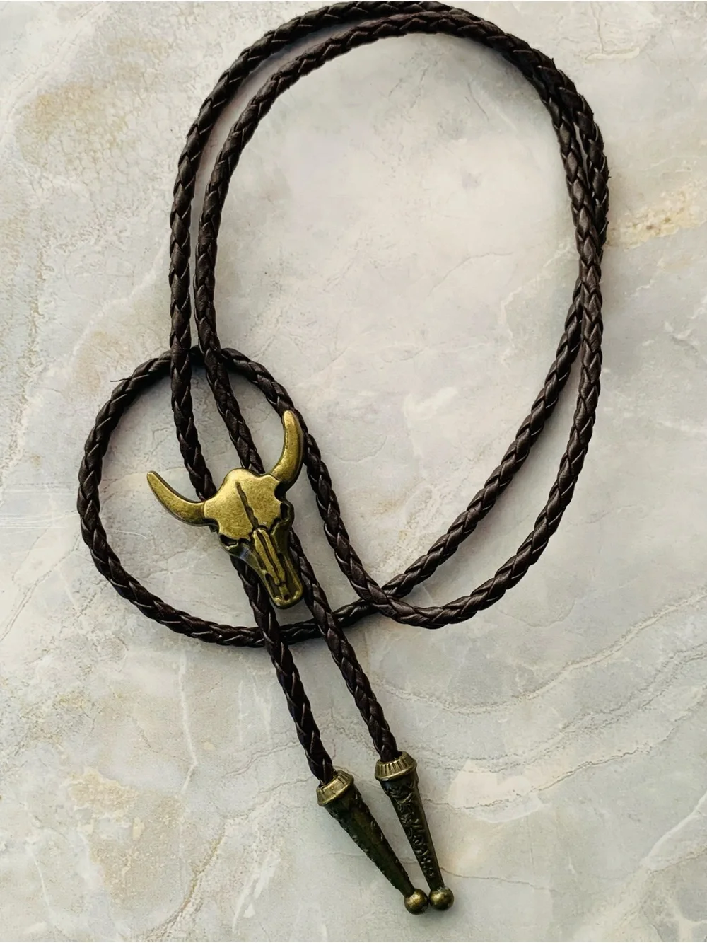 Western Bull Skull Bolo Tie in Brown Leather and Antique Brass